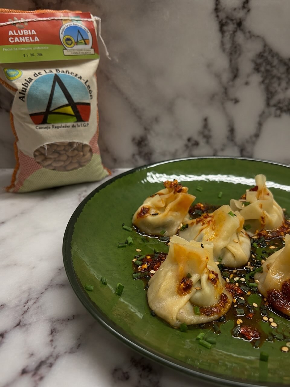 Dumplings de alubia canela IGP de la Bañeza con corazón líquido umami